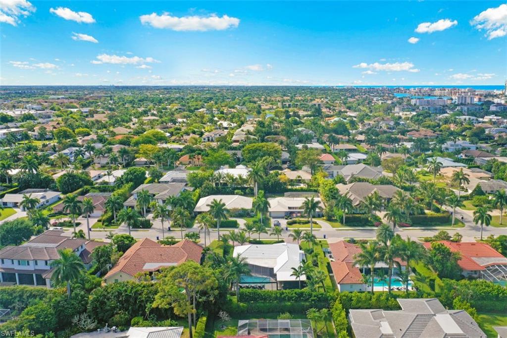 549 Neapolitan Way Naples, FL 34103 - Photo 33 of 35 an aerial view of residential houses with outdoor space and street view