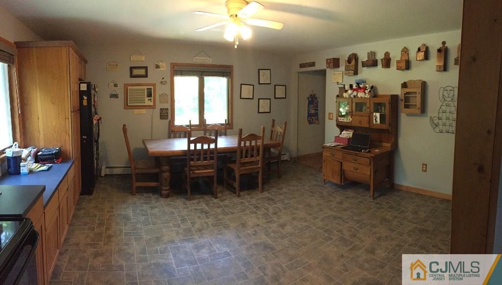 230 Deans Rhode Hall Road Monroe Township, NJ 08831 - Photo 2 of 11 a view of a room with lots of furniture and window