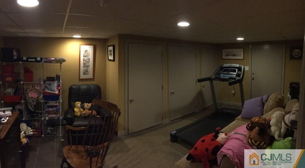 230 Deans Rhode Hall Road Monroe Township, NJ 08831 - Photo 8 of 11 a view of a room with gym equipment