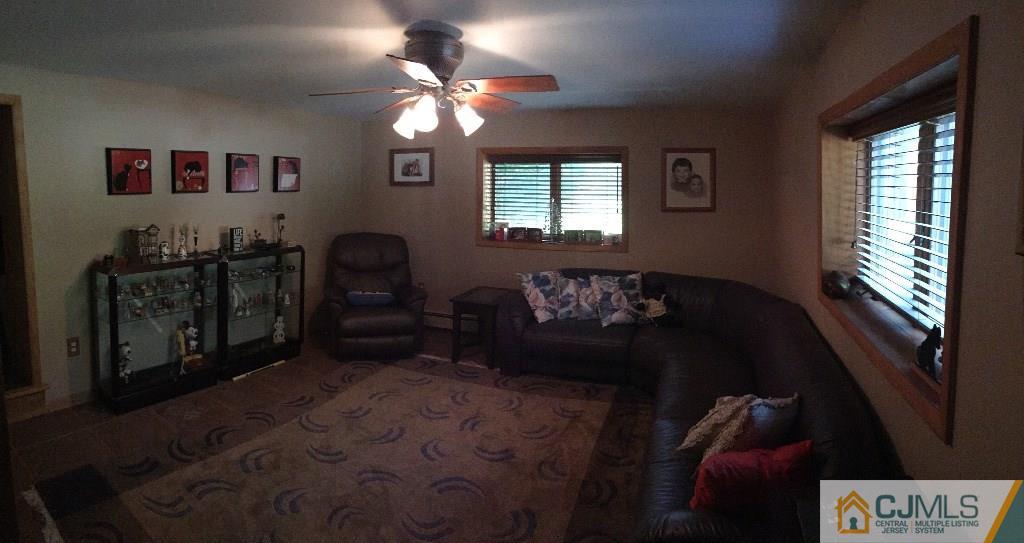 230 Deans Rhode Hall Road Monroe Township, NJ 08831 - Photo 9 of 11 a living room with furniture and a window