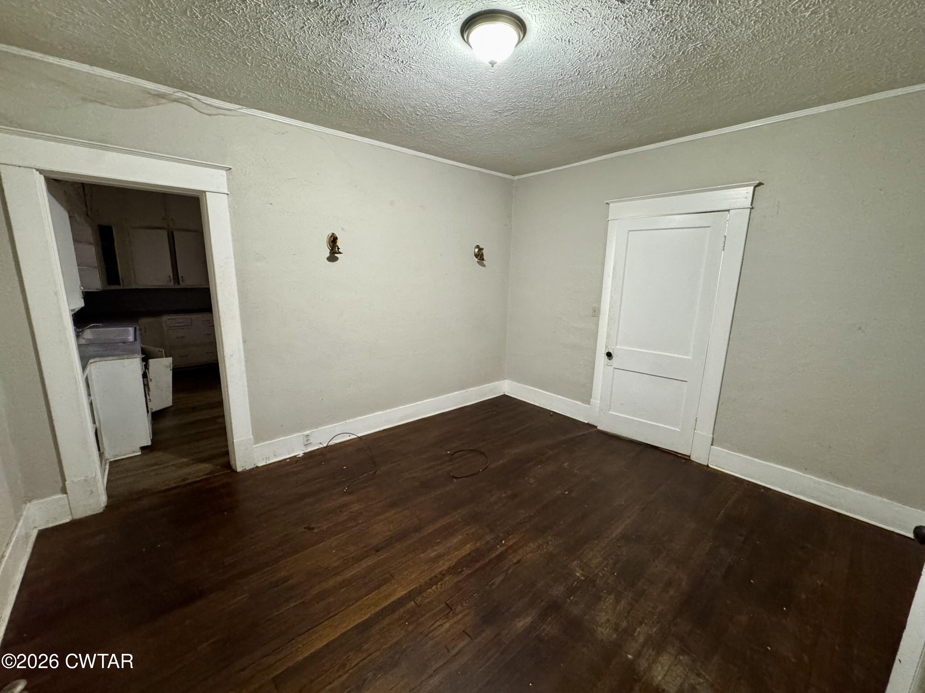 127 South Fairgrounds Street Jackson, TN 38301 - Photo 9 of 23 wooden floor in an empty room