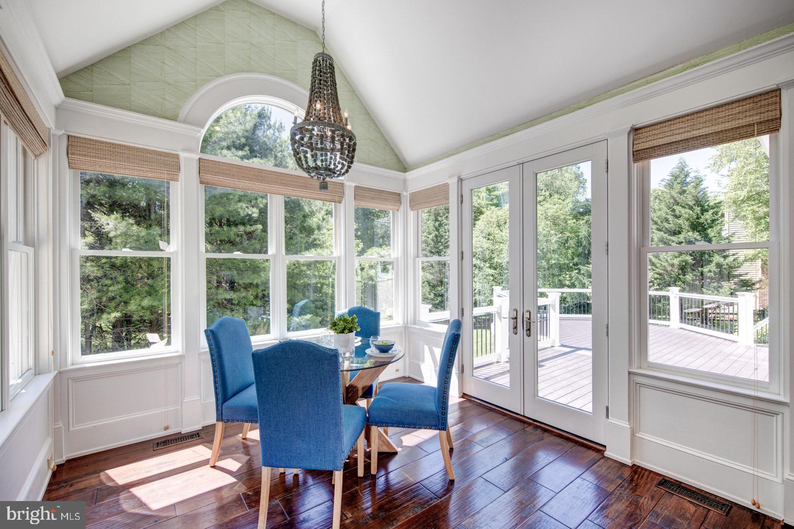 121 Brooke Farm Road Wayne, PA 19087 - Photo 11 of 46 a view of a dining room with furniture window and wooden floor
