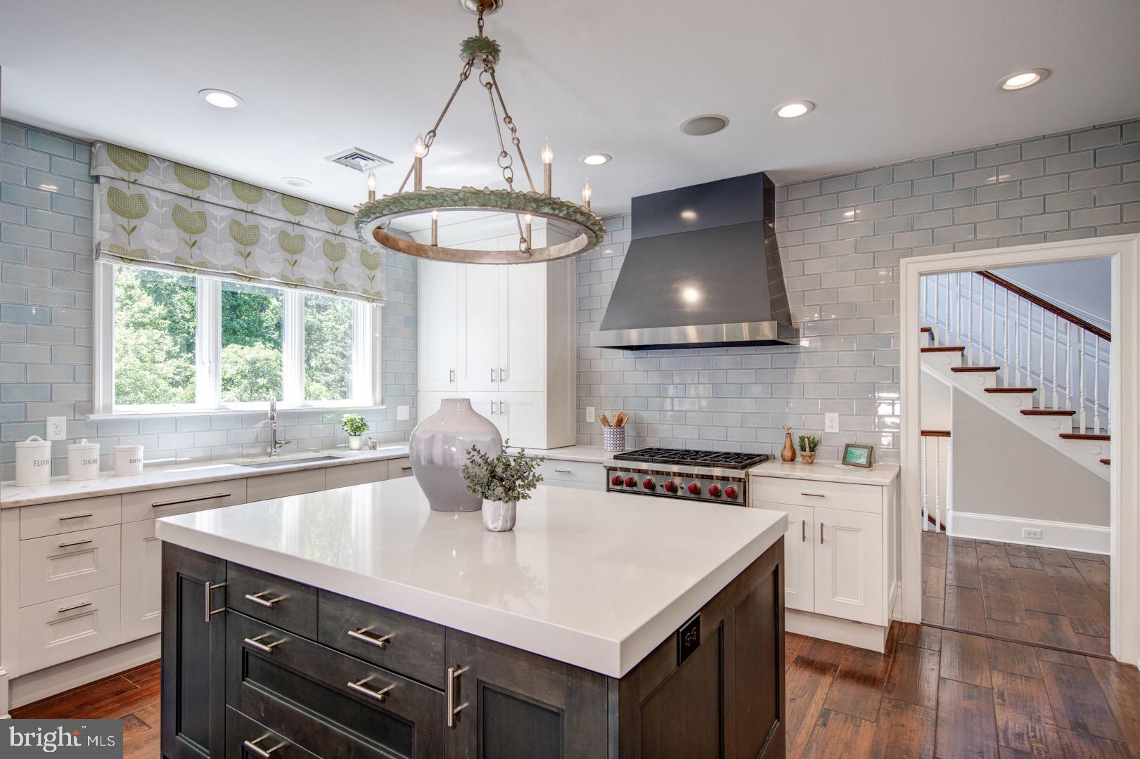 121 Brooke Farm Road Wayne, PA 19087 - Photo 12 of 46 a kitchen with a sink a window and cabinets
