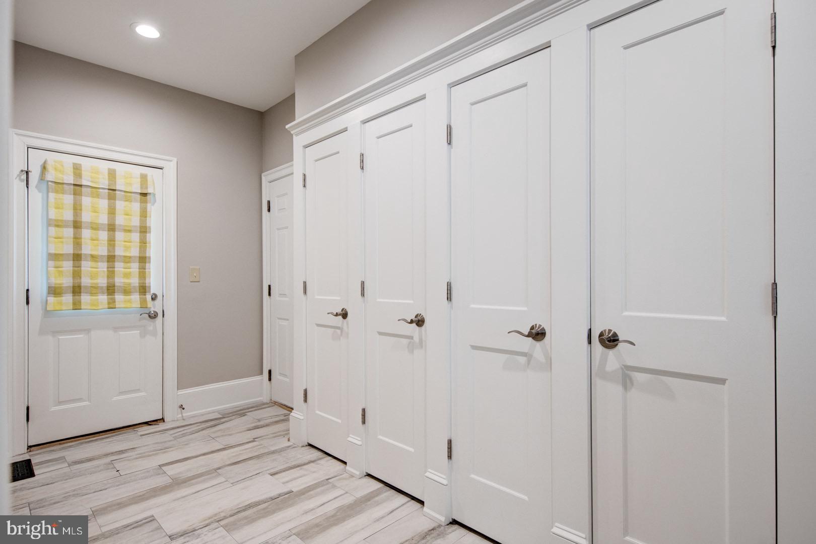 121 Brooke Farm Road Wayne, PA 19087 - Photo 20 of 46 a view of a bathroom with a shower and wooden floor