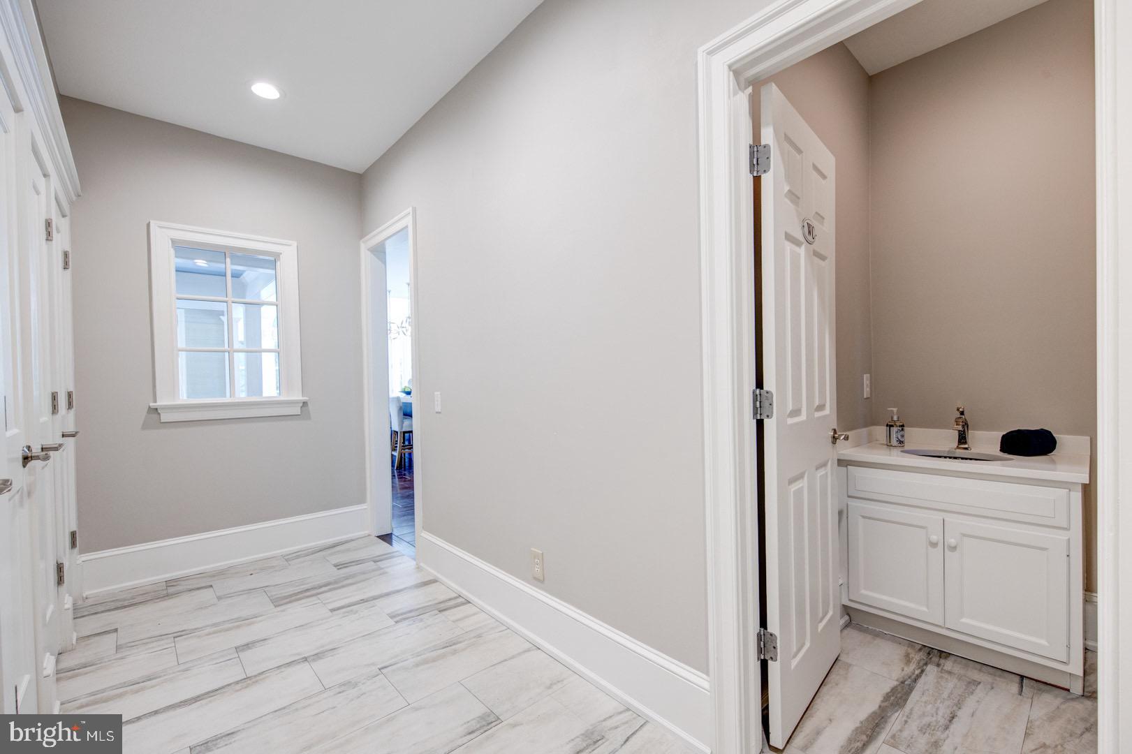121 Brooke Farm Road Wayne, PA 19087 - Photo 21 of 46 a bathroom with a sink and a mirror