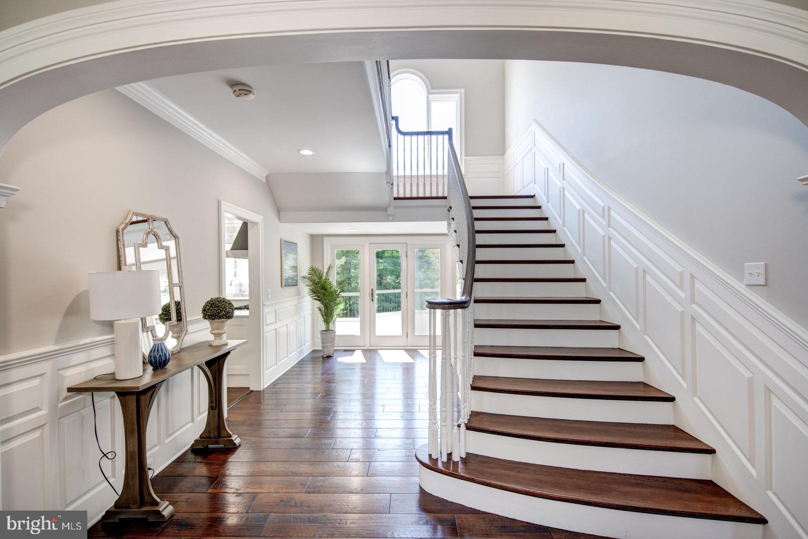121 Brooke Farm Road Wayne, PA 19087 - Photo 22 of 46 a view of entryway and hall with wooden floor
