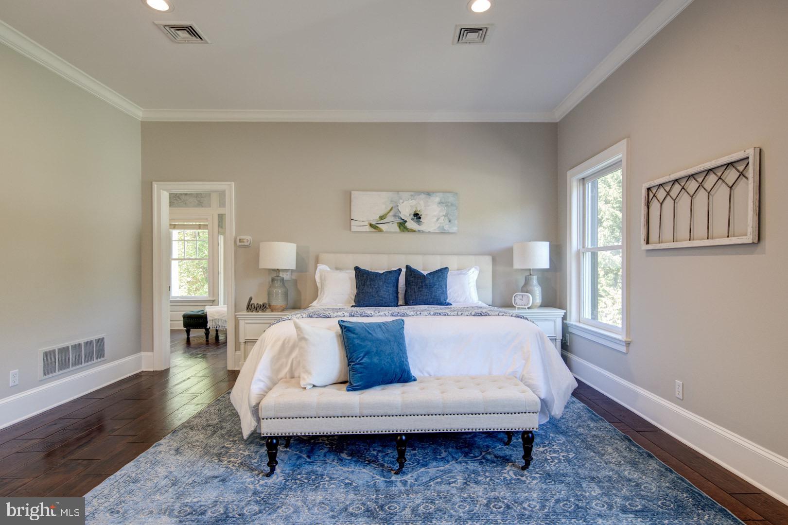 121 Brooke Farm Road Wayne, PA 19087 - Photo 23 of 46 a spacious bedroom with a bed and window