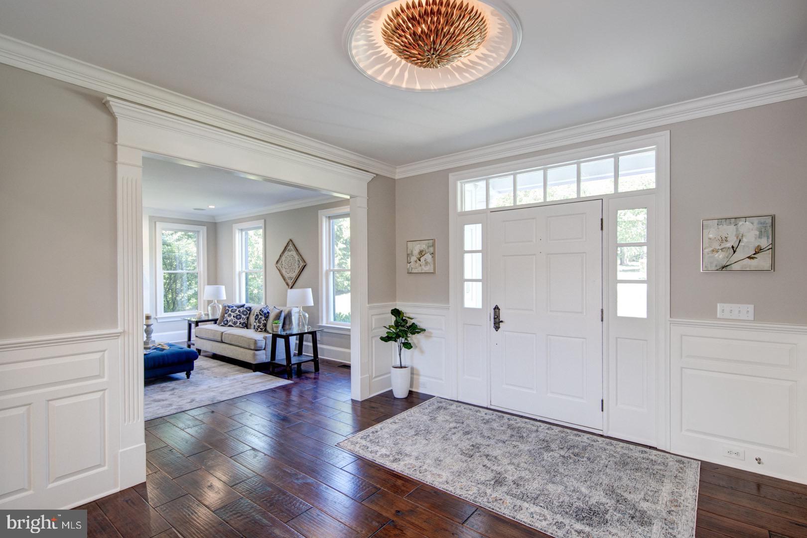 121 Brooke Farm Road Wayne, PA 19087 - Photo 4 of 46 a living room with furniture and a large window