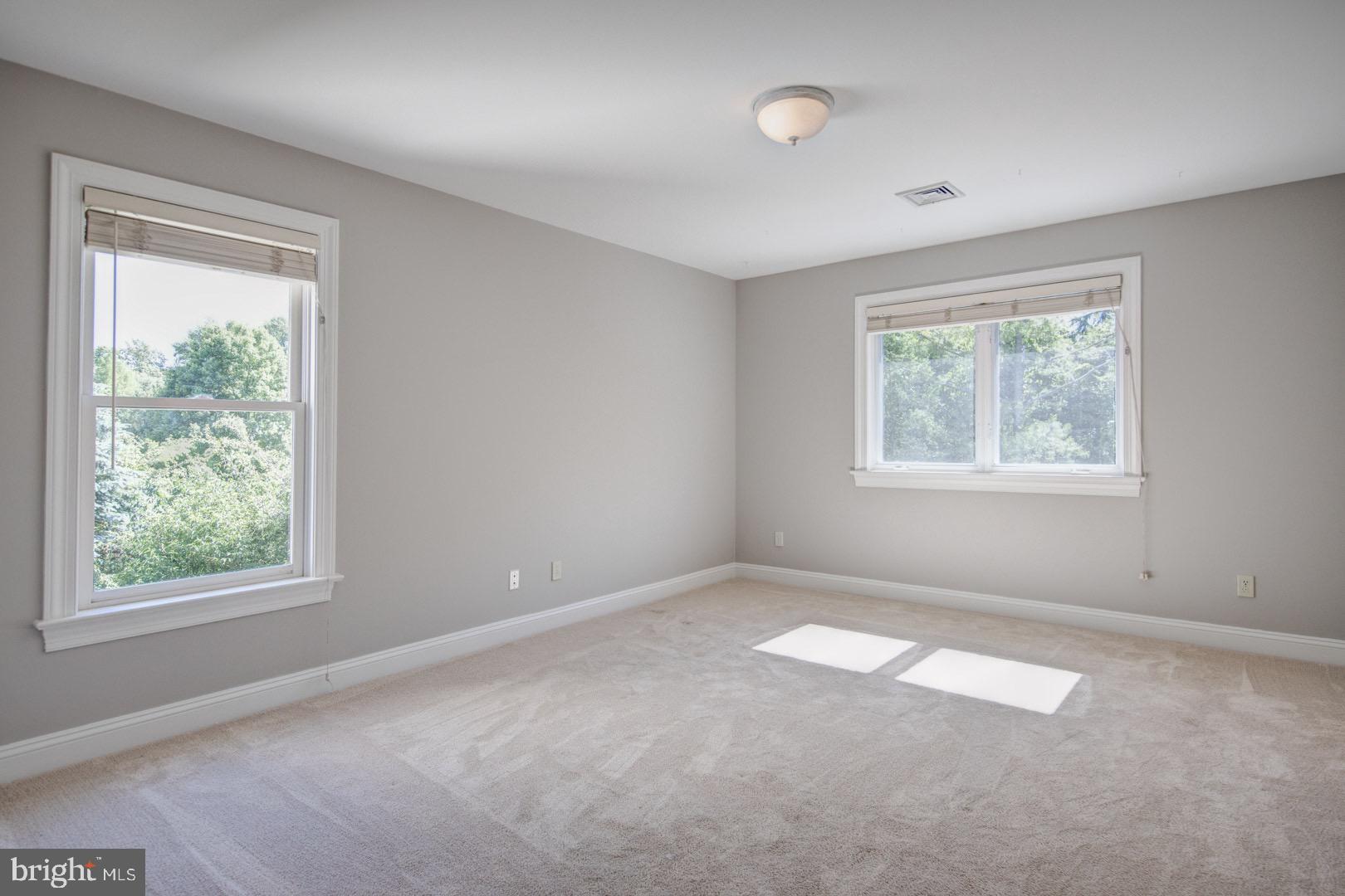 121 Brooke Farm Road Wayne, PA 19087 - Photo 33 of 46 a view of a big room with windows and closet