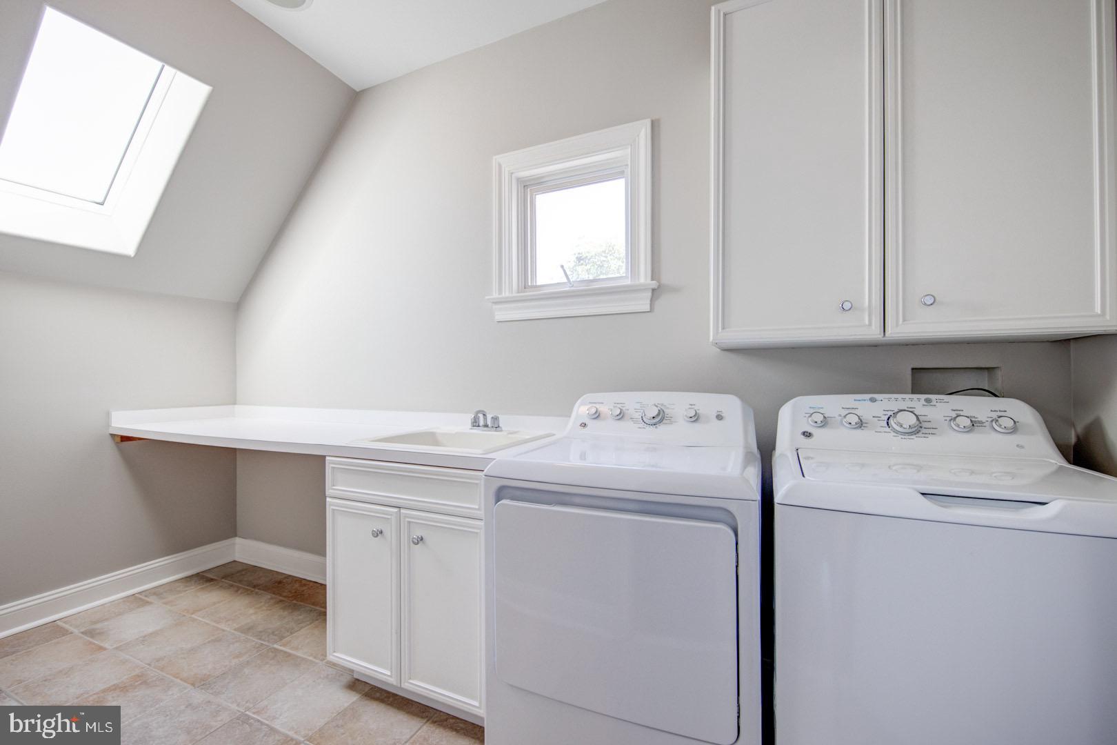 121 Brooke Farm Road Wayne, PA 19087 - Photo 36 of 46 a utility room with dryer and washer