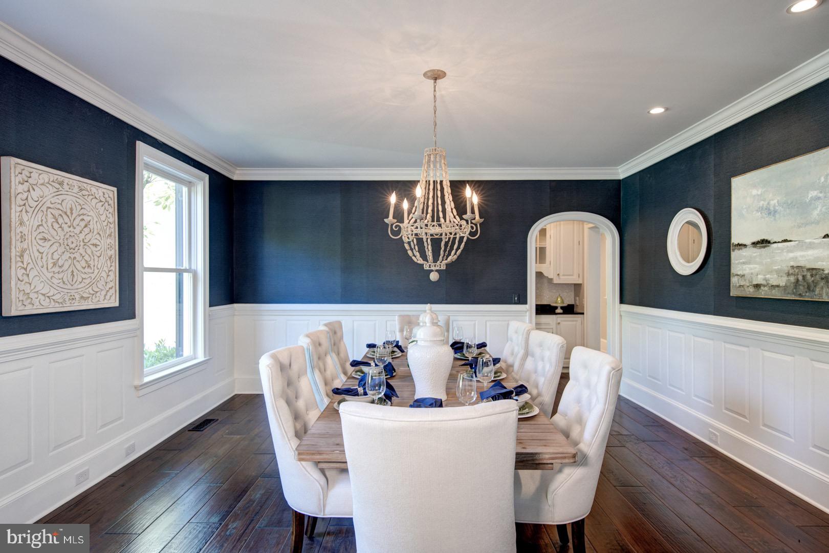 121 Brooke Farm Road Wayne, PA 19087 - Photo 7 of 46 a view of a dining room with furniture window and wooden floor
