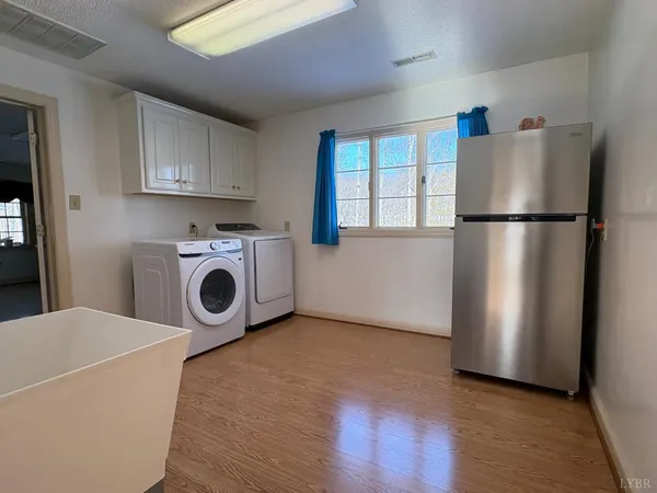 a view of a large house with a yard