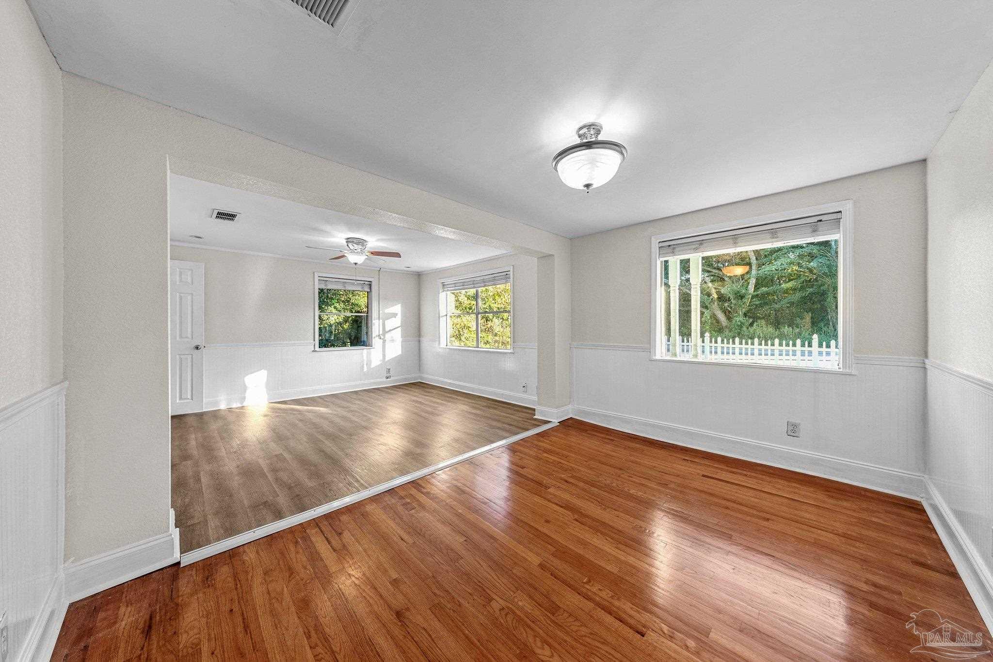 162 West Burgess Road Pensacola, FL 32503 - Photo 12 of 30 an empty room with windows