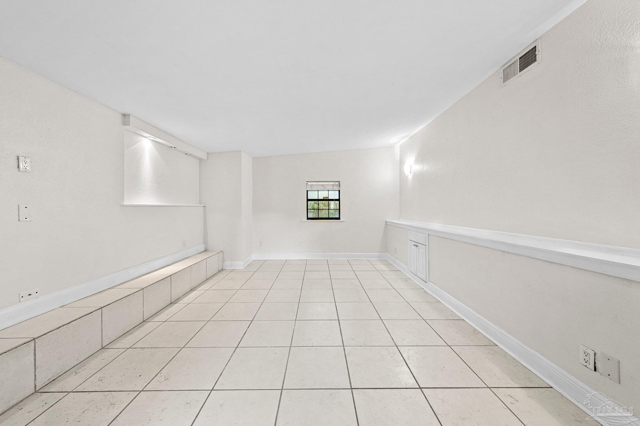 162 West Burgess Road Pensacola, FL 32503 - Photo 13 of 30 a view of an empty room and window