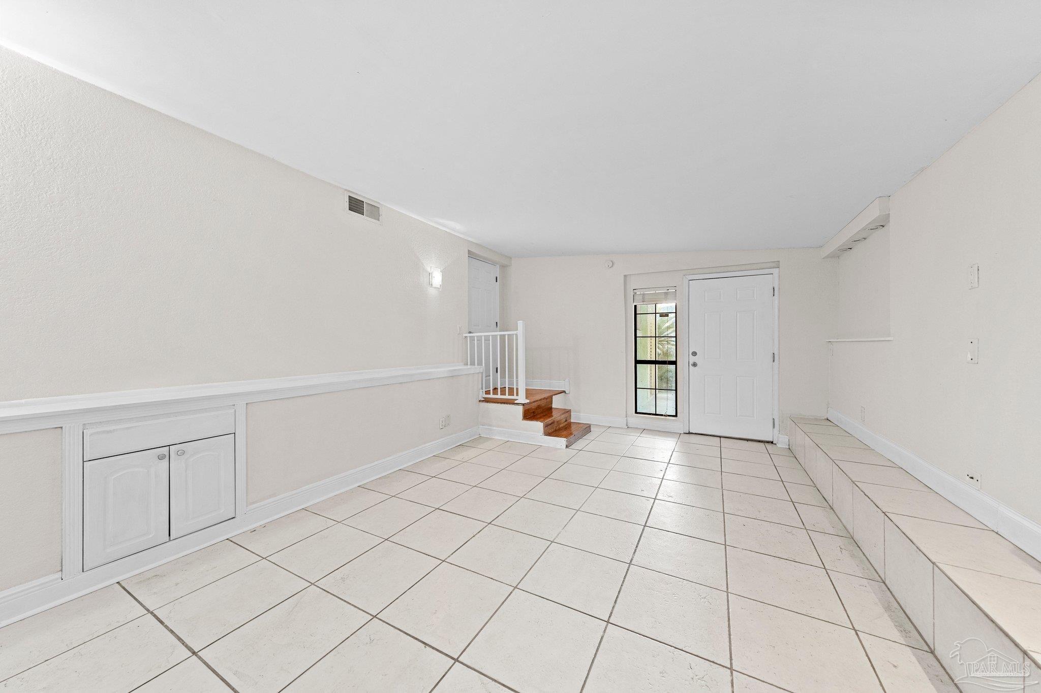 162 West Burgess Road Pensacola, FL 32503 - Photo 14 of 30 a view of an empty room and window