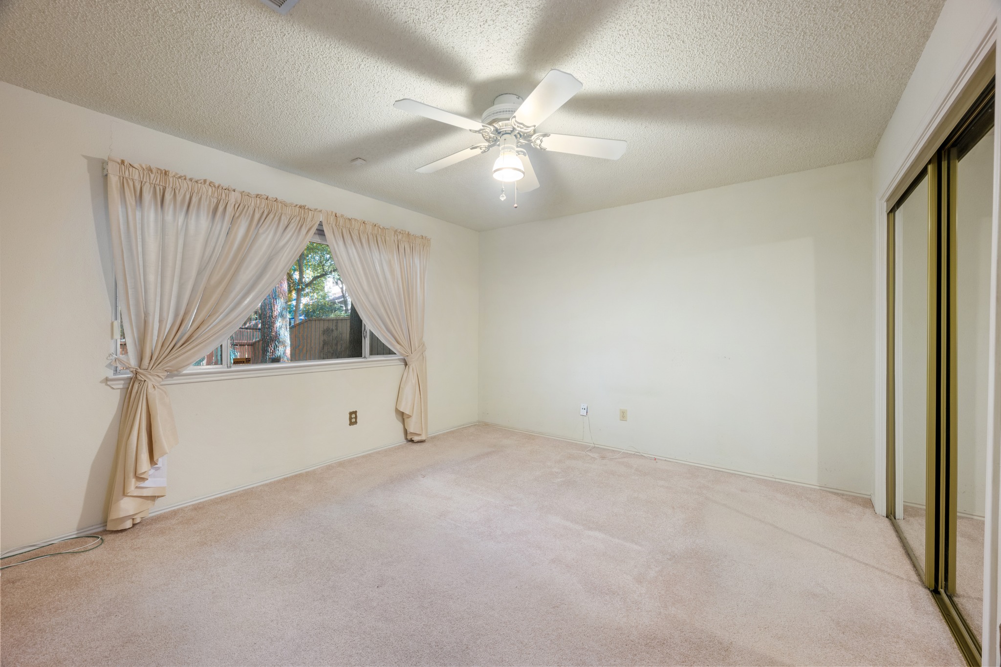 8318 Bent Tree Road Austin, TX 78759 - Photo 22 of 37 Located at the very back of the home for maximum privacy, the primary suite offers a quiet retreat at the end of the day