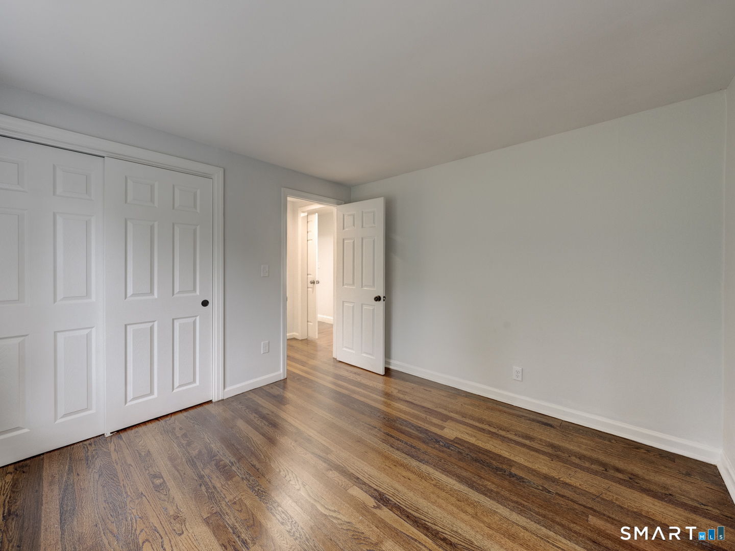 11 Cheshire Road Prospect, CT 06712 - Photo 20 of 38 a view of an empty room and wooden floor