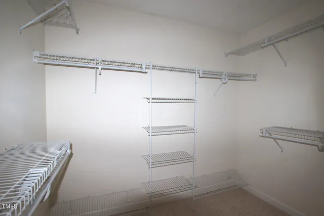 a view of empty room with windows