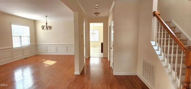 a view of entryway with wooden floor