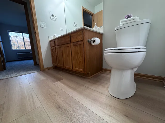 a view of a storage & utility room with closet washer and dryer