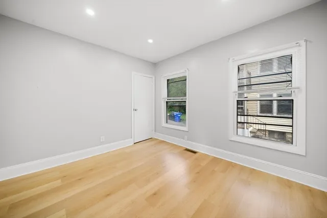 a view of empty room with front door