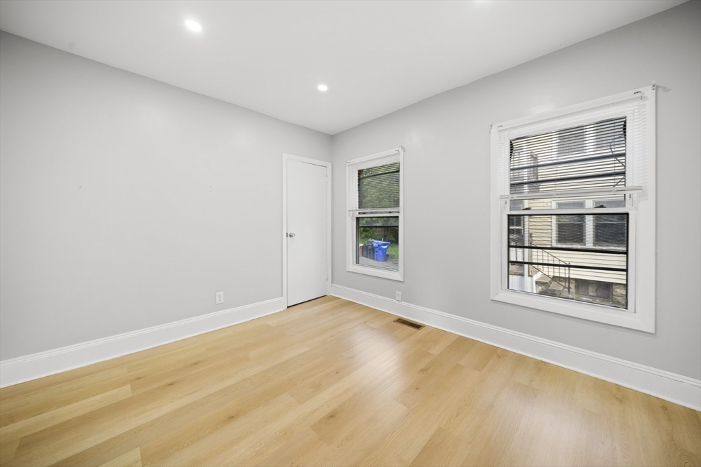 57 Narragansett Street Springfield, MA 01107 - Photo 18 of 41 a view of empty room with front door