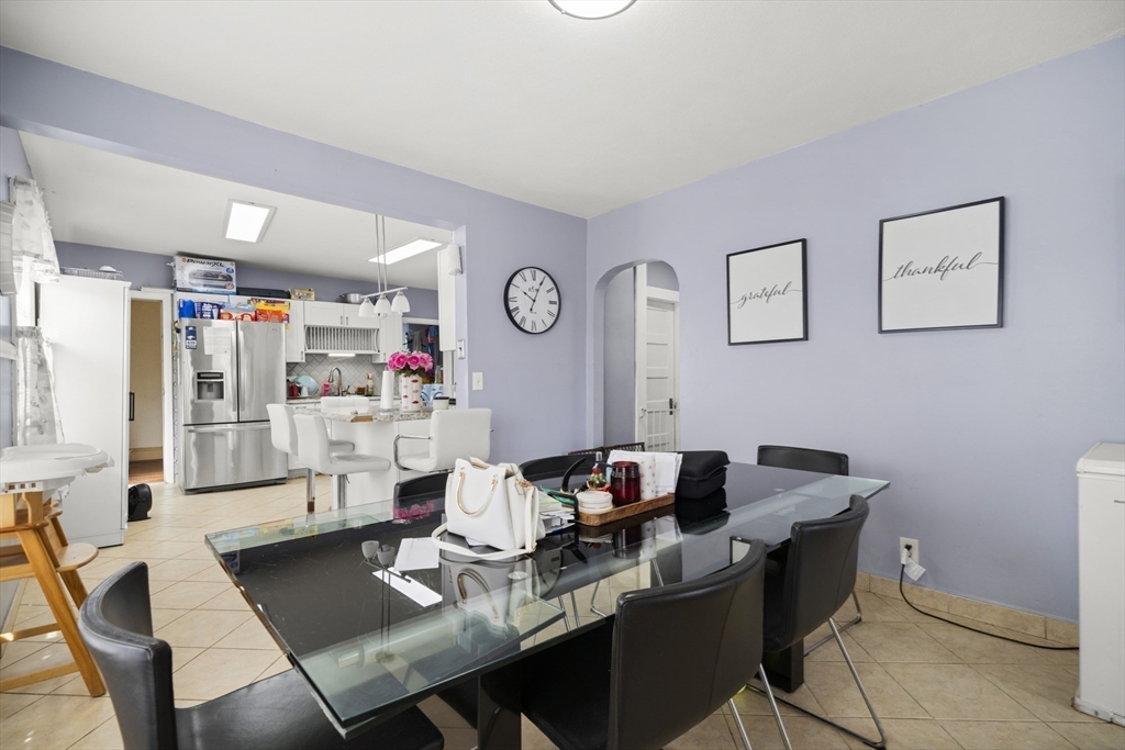 57 Narragansett Street Springfield, MA 01107 - Photo 29 of 41 a dining room with furniture and wooden floor