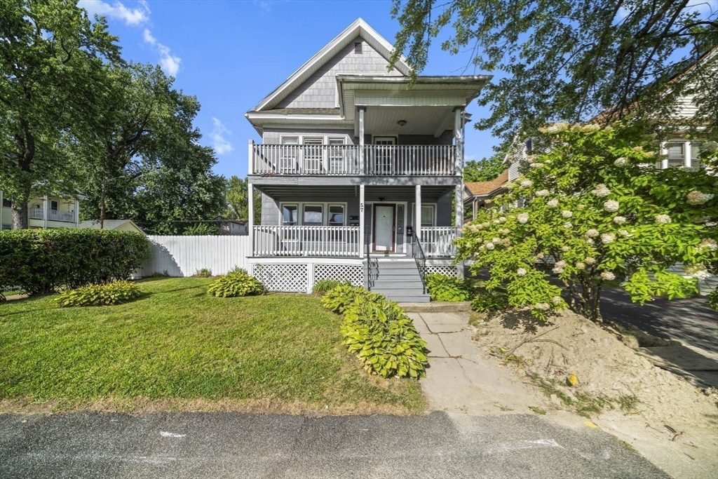 57 Narragansett Street Springfield, MA 01107 - Photo 39 of 41 a front view of a house with garden