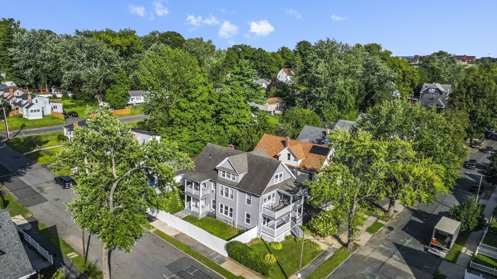 57 Narragansett Street Springfield, MA 01107 - Photo 40 of 41 an aerial view of a house with garden space and street view