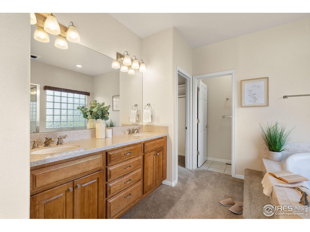 2102 Meander Road Windsor, CO 80550 - Photo 12 of 35 Primary Bathroom with Dual Sinks