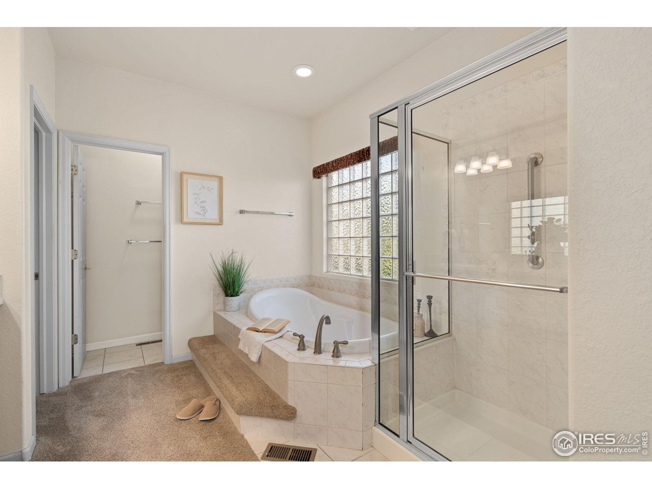 2102 Meander Road Windsor, CO 80550 - Photo 13 of 35 Primary Bathroom with a Soaking Tub