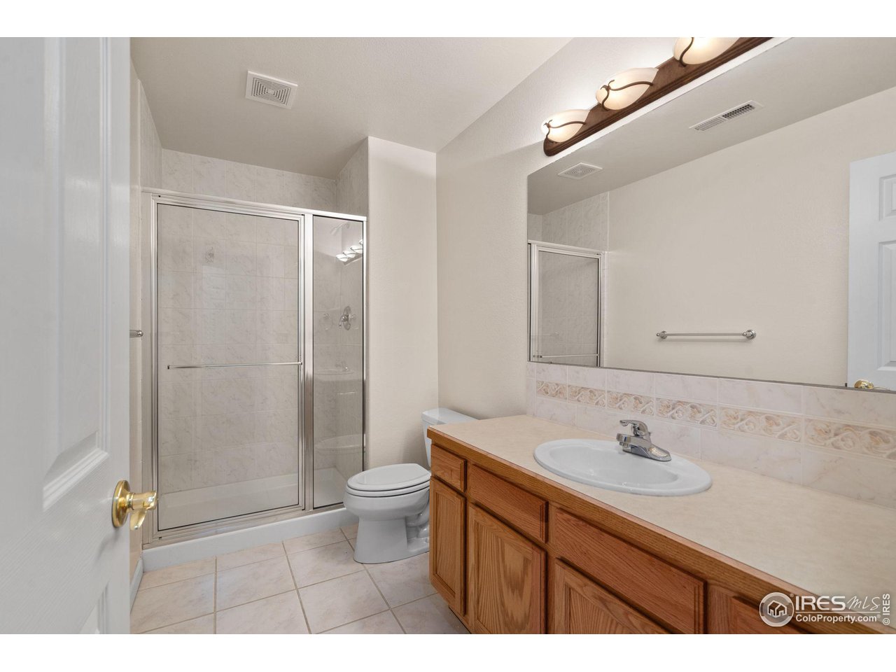 2102 Meander Road Windsor, CO 80550 - Photo 22 of 35 Basement Bathroom with Large Walk-In Shower
