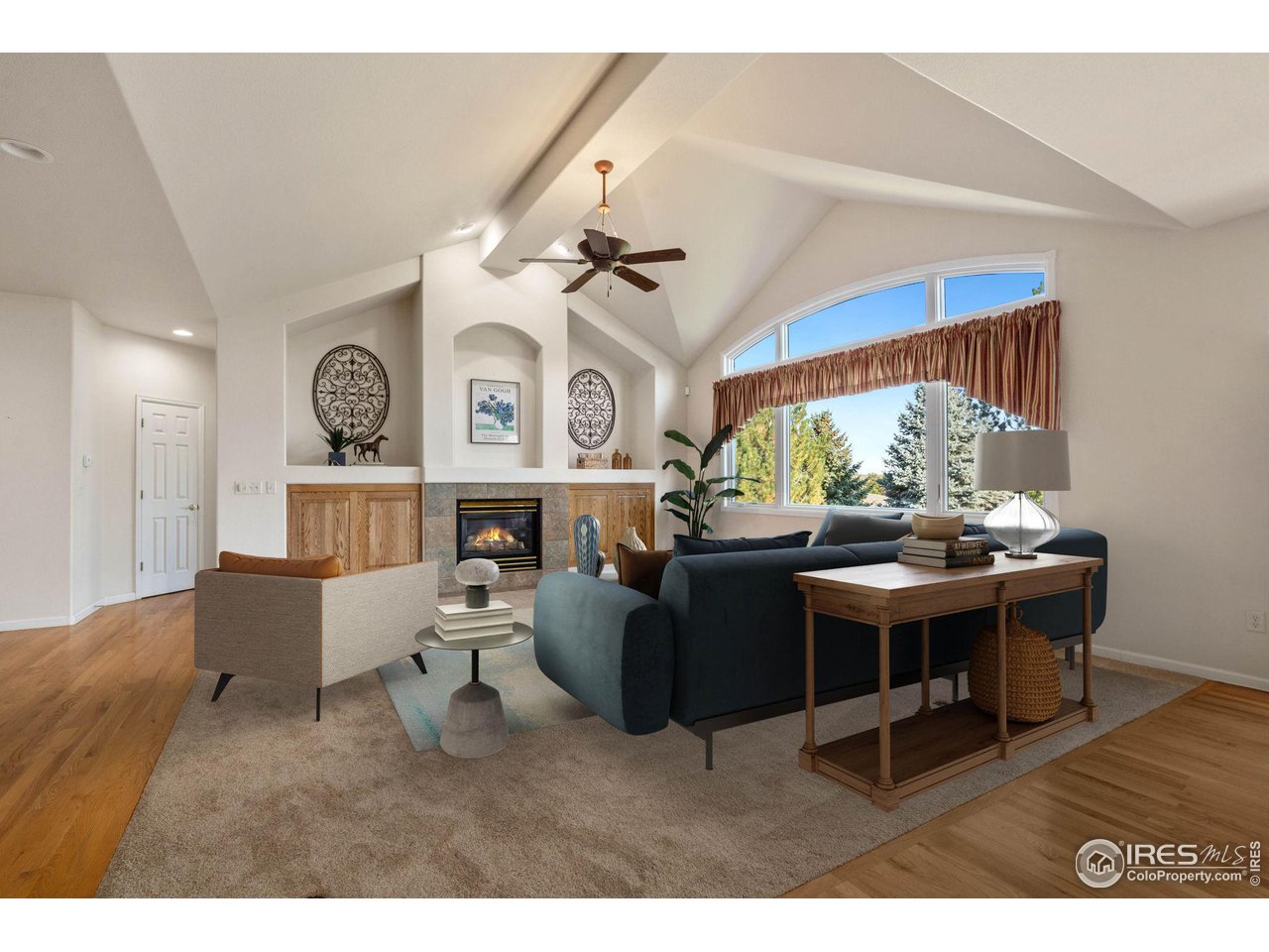 2102 Meander Road Windsor, CO 80550 - Photo 6 of 35 Great Room with Cozy Fireplace