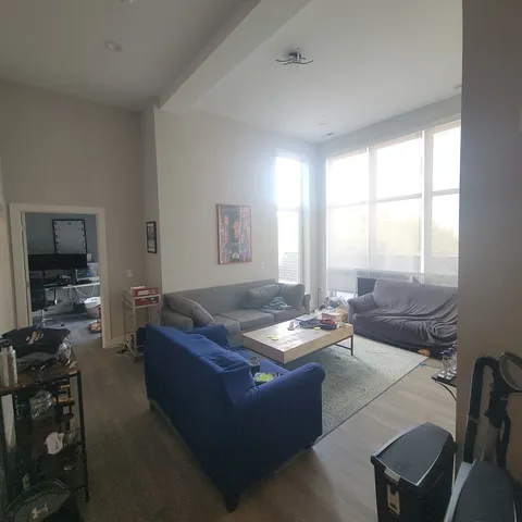 a living room with furniture and window