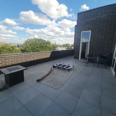 a view of outdoor space with lounge chair