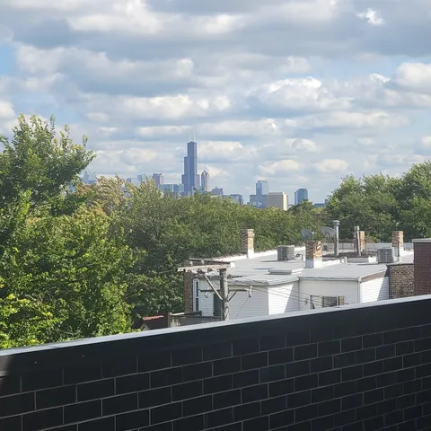 a view of a balcony with city view