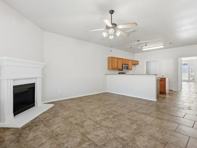 a view of a livingroom with a fireplace