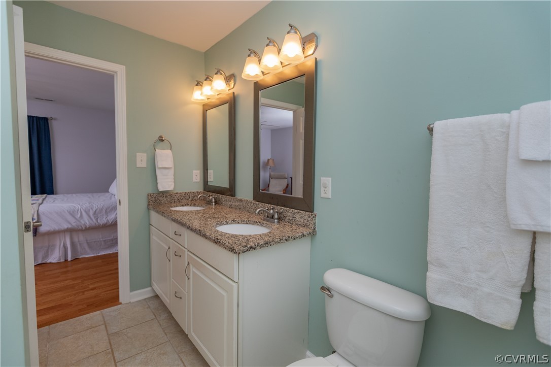 1394 Falls Road Victoria, VA 23974 - Photo 15 of 45 a bathroom with a sink and a mirror