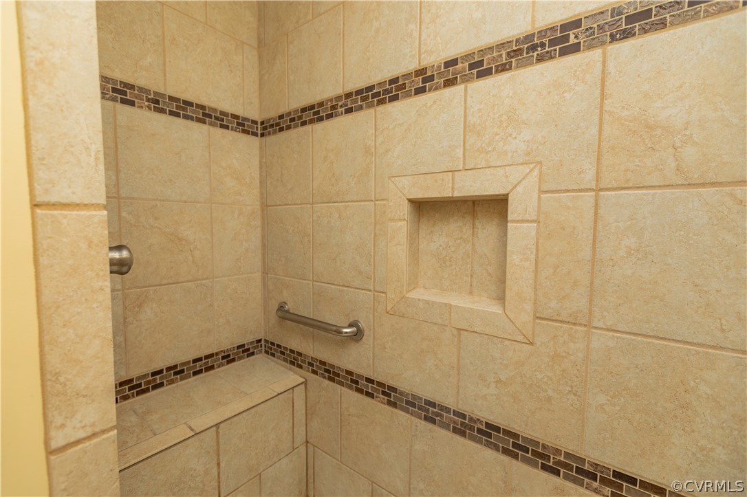 1394 Falls Road Victoria, VA 23974 - Photo 22 of 45 a bathroom with a window and a shower