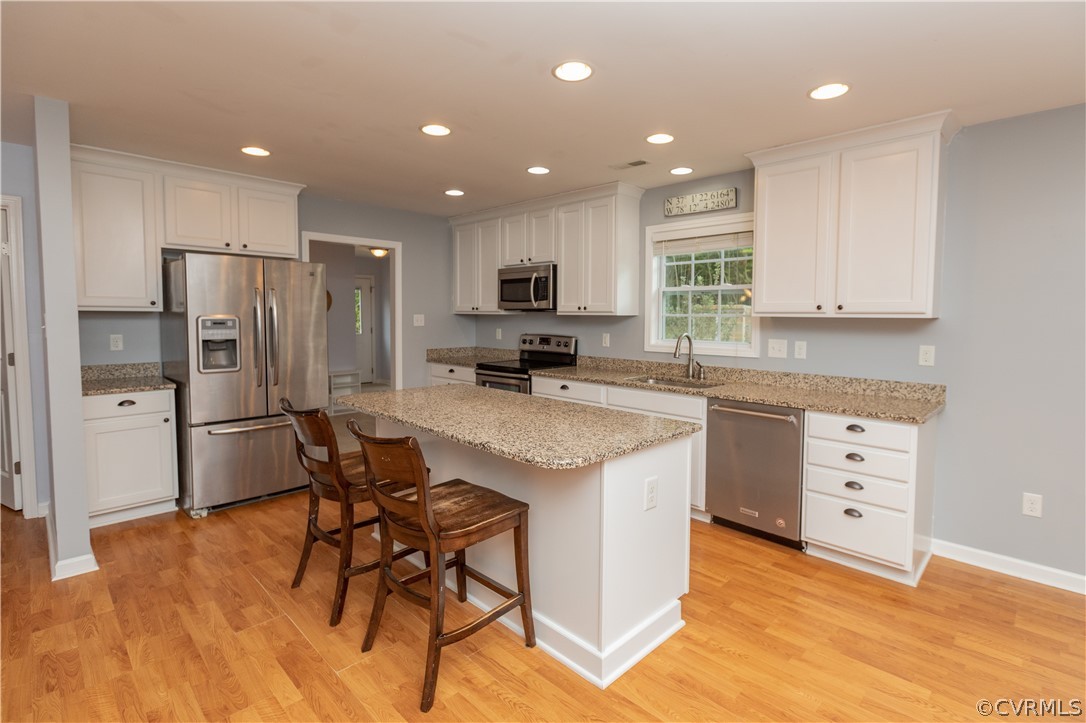 1394 Falls Road Victoria, VA 23974 - Photo 3 of 45 a kitchen with stainless steel appliances kitchen island granite countertop a refrigerator and a stove top oven