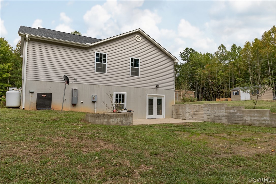 1394 Falls Road Victoria, VA 23974 - Photo 34 of 45 a view of a house with backyard and trees