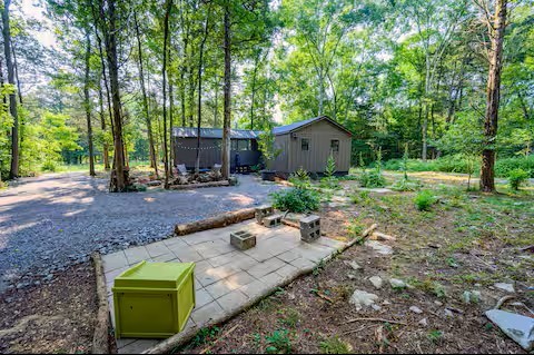 233 Porterfield Road Readyville, TN 37149 - Photo 13 of 32 a backyard of a house with seating space
