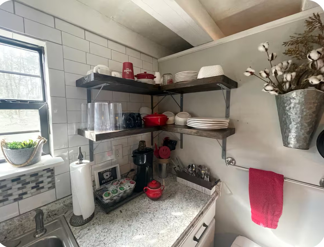 233 Porterfield Road Readyville, TN 37149 - Photo 17 of 32 a kitchen with a stove and cabinets