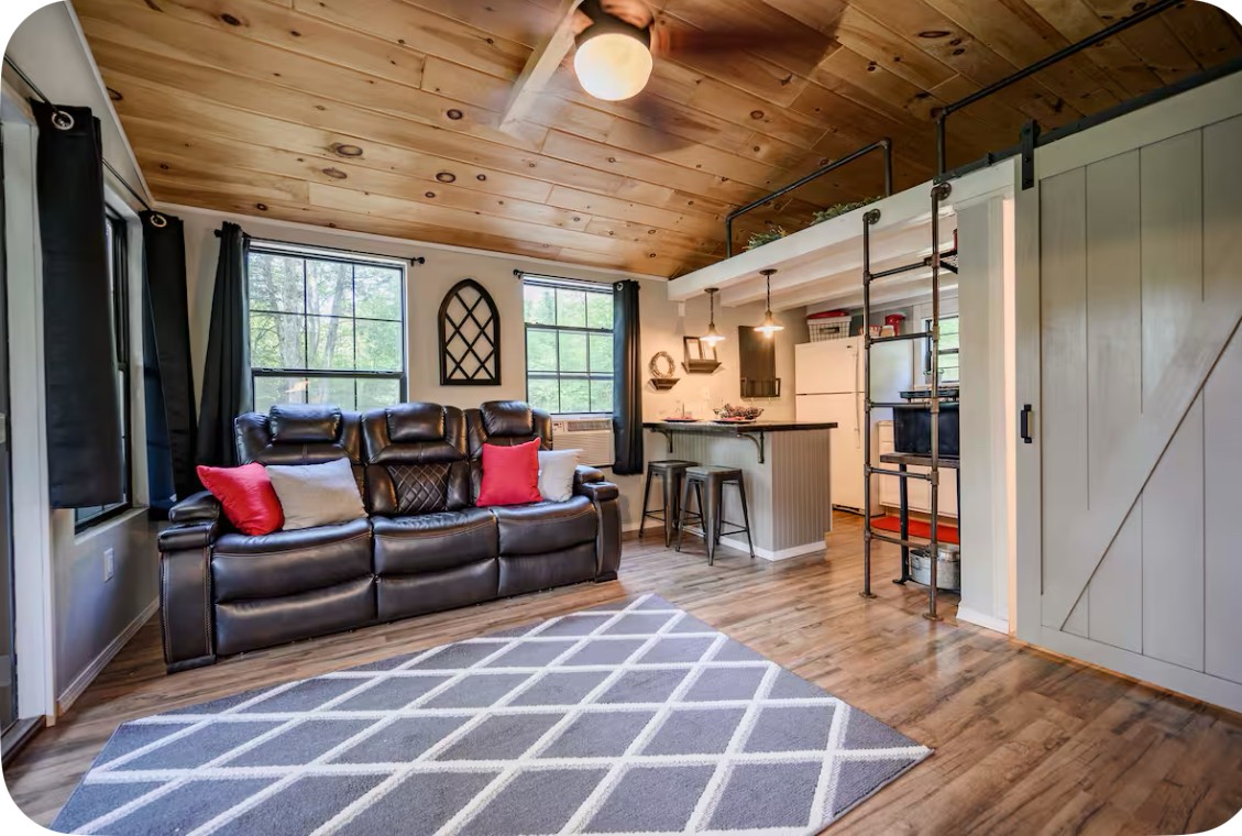 233 Porterfield Road Readyville, TN 37149 - Photo 20 of 32 a living room with furniture a wooden floor and a window