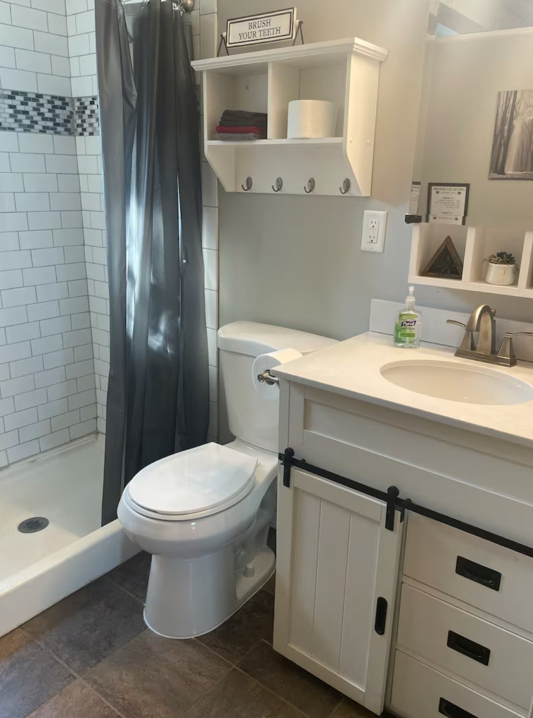 233 Porterfield Road Readyville, TN 37149 - Photo 28 of 32 a bathroom with a sink toilet and shower