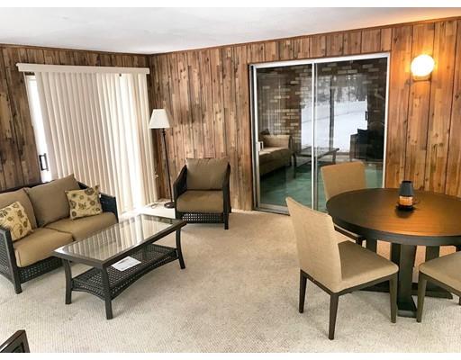 37 Temi Road Hudson, MA 01749 - Photo 8 of 30 a living room with furniture and a table