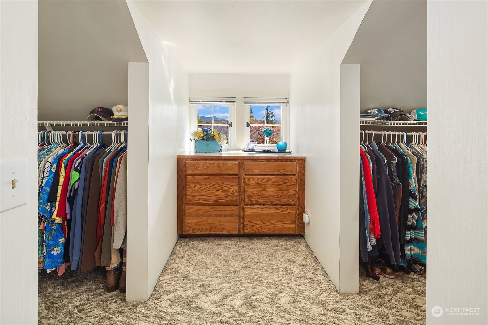 705 3rd Street Sultan, WA 98294 - Photo 12 of 26 a view of walk in closet with clothes and shoes