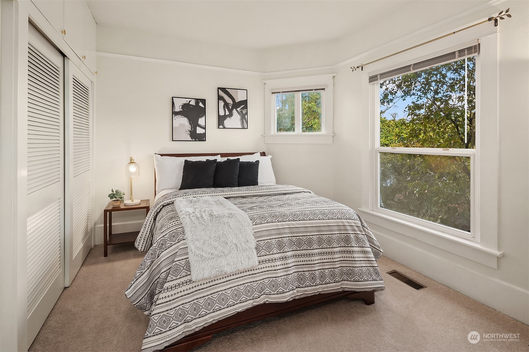 705 3rd Street Sultan, WA 98294 - Photo 13 of 26 a bedroom with a bed and a window