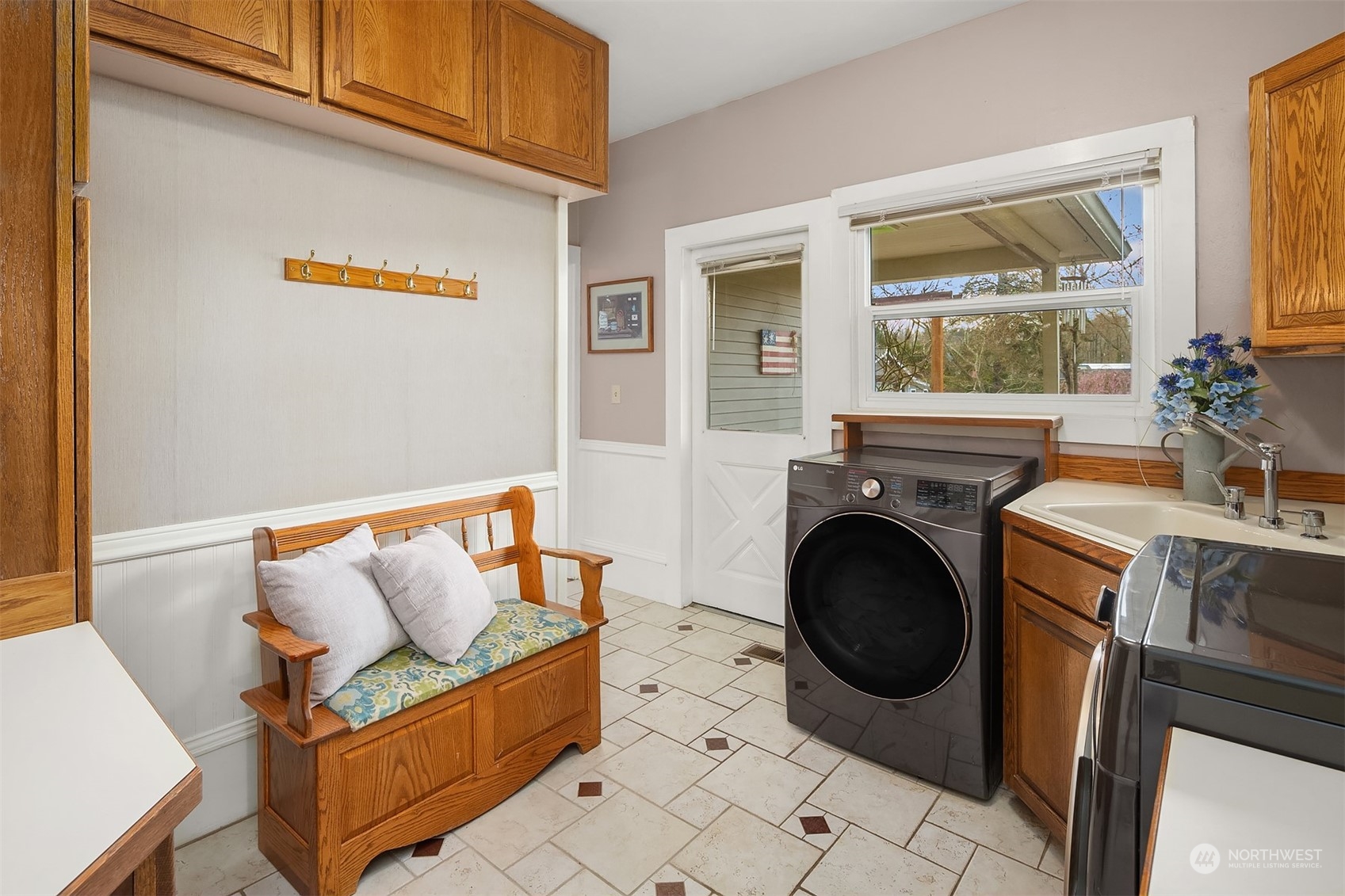 705 3rd Street Sultan, WA 98294 - Photo 17 of 26 a living room with furniture and a window