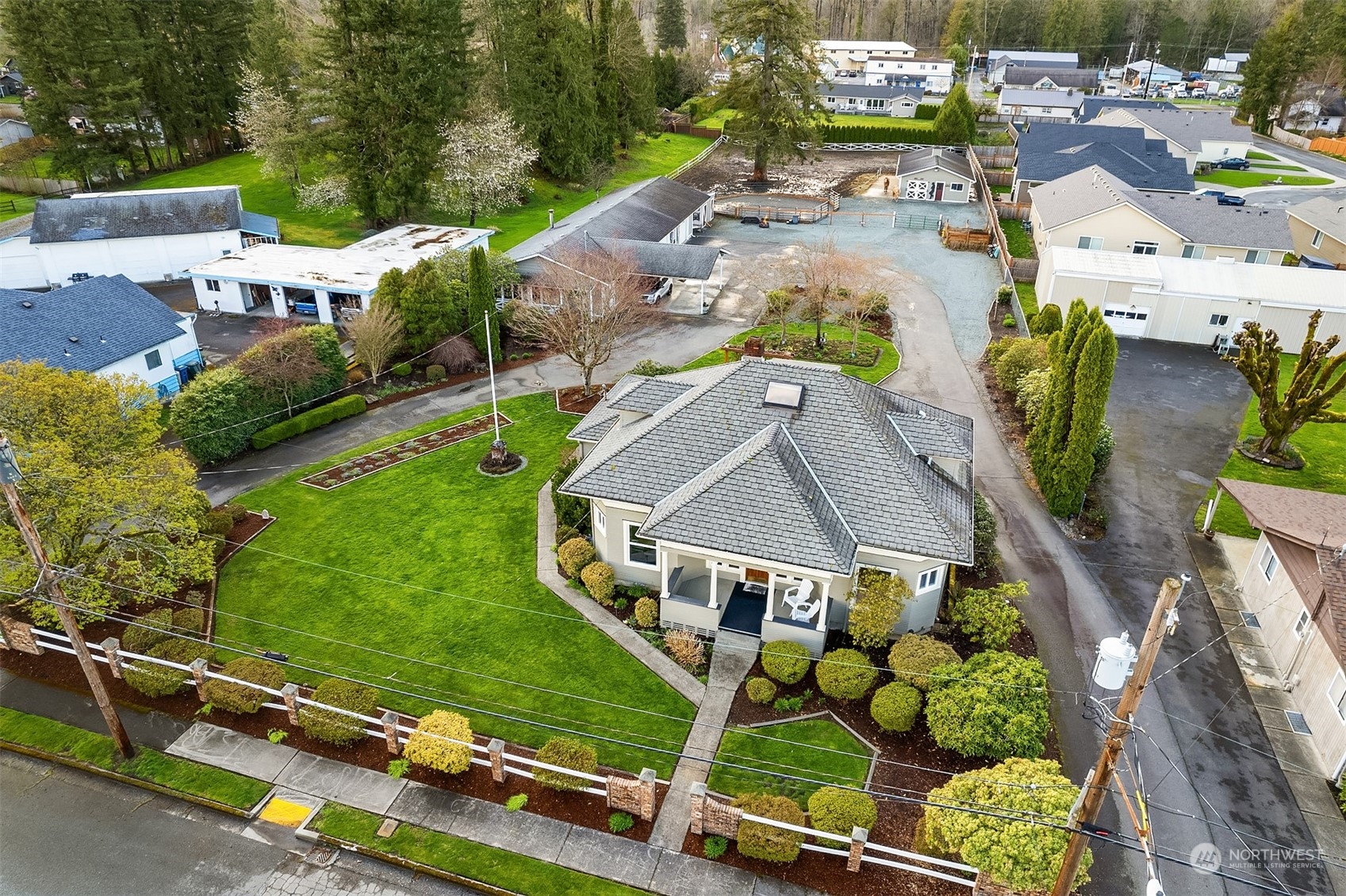 705 3rd Street Sultan, WA 98294 - Photo 20 of 26 an aerial view of multiple houses with yard